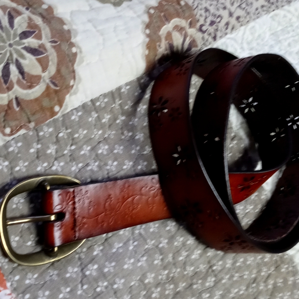 Leather belt with punched floral motif 36-41”